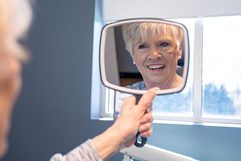 Patient looking into mirror