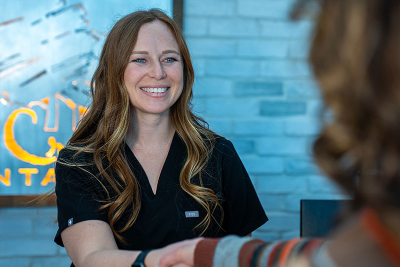 team member consulting with patient